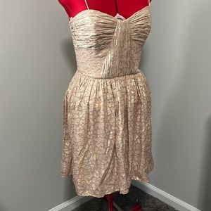 Short prom dress. Shimmery fabric in a sort of leopard design (but it’s subtle)